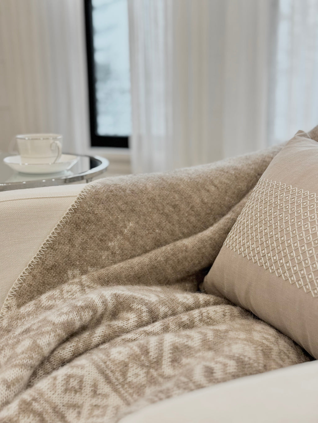 Embroidered Icelandic Lambswool Blanket Flax + Ivory - Chair close up 